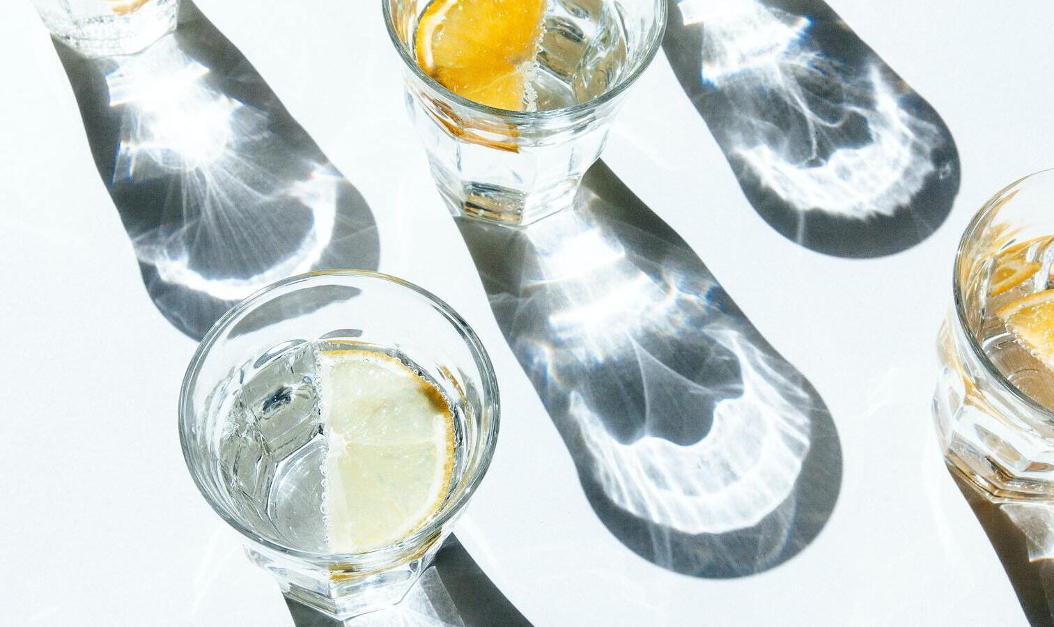 Glasses of water with shadows