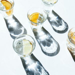 Glasses of water with shadows