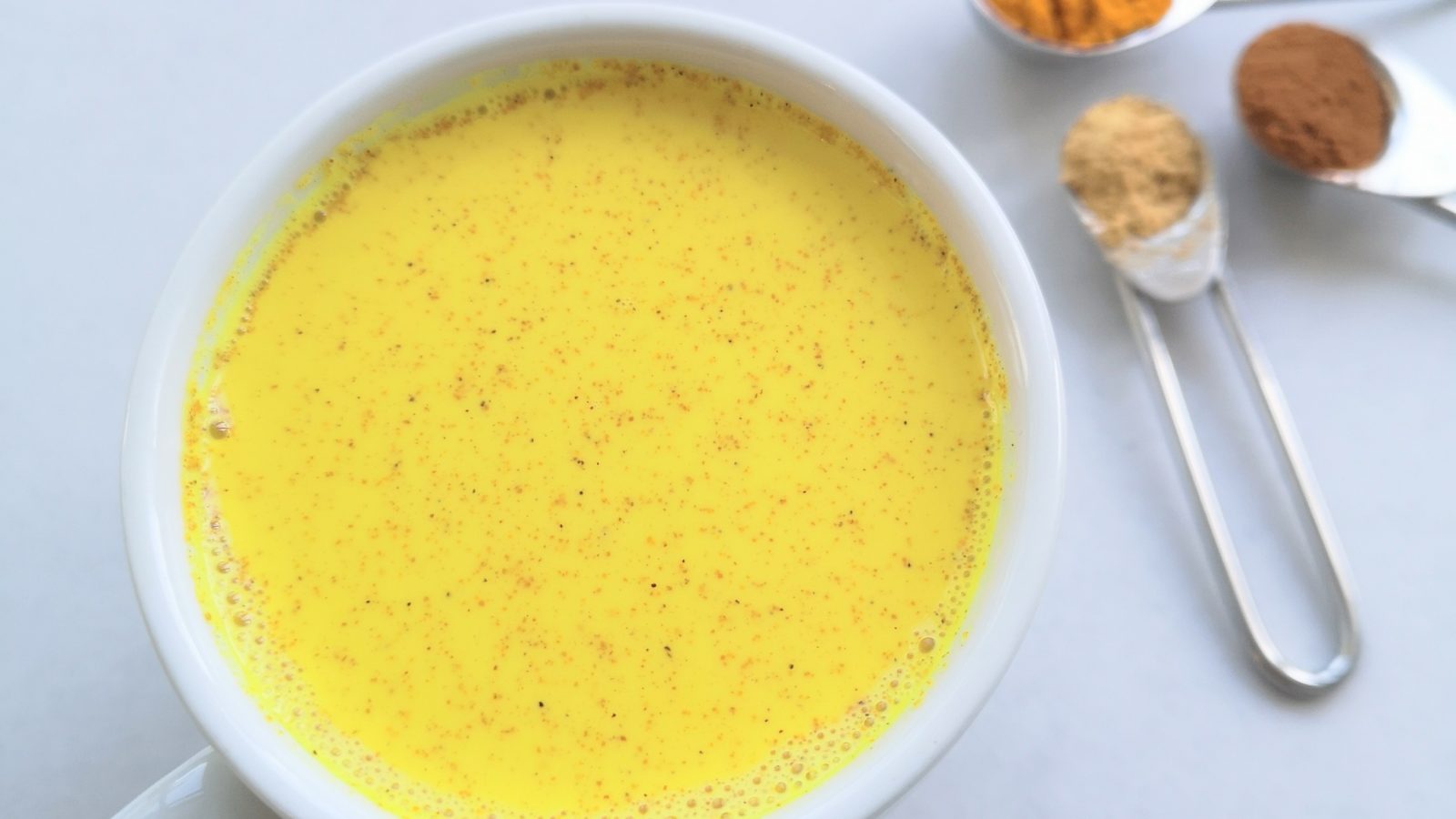 Mug of turmeric latte