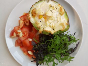 Baked avocados and salad