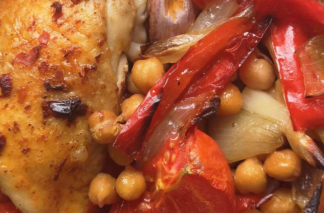 Harissa coated chicken with chickpeas, tomatoes and red pepper
